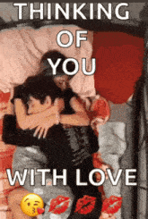 a picture of a man and woman hugging with the words thinking of you with love
