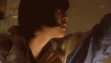 a close up of a woman 's face is shown on a tv show