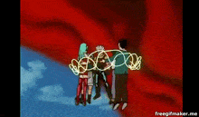 a group of people are standing next to each other in a circle in the sky .