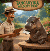 a man and a hippo are standing in front of a sign for tanganyika wildlife park
