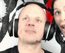 a man wearing headphones with a microphone on his head