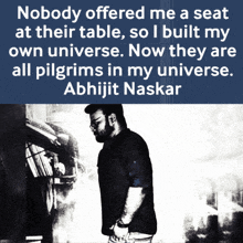 a black and white photo of a man with a quote behind him