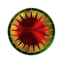a green and yellow circle with a red burst in the center