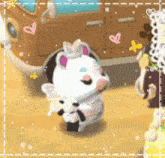a stuffed animal with a crown on its head is holding a panda