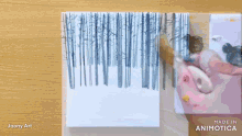 a person is painting trees on a piece of paper with the words made in animatica on the bottom right