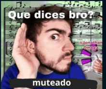 a man with a beard holds his hand to his ear in front of sheet music that says que dices bro