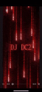 a phone screen shows the word dj on a matrix background