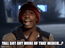 a man wearing a red hat is asking if he has any more of that merch