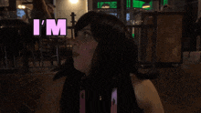 a woman in a wig says " overstimulated " in pink letters