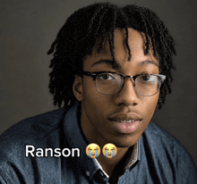 a picture of a young man with glasses and the name ranson on the bottom