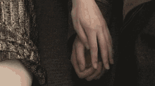 Couple Holding Hands GIF