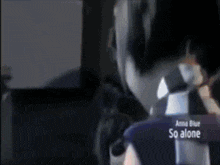 a blurry picture of a person with the words so alone on it