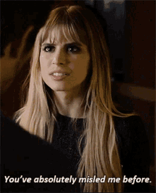 a woman with long blonde hair says you 've absolutely missed me before