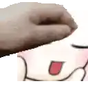 a hand is touching a cartoon character 's face with a red tongue .