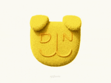 a yellow stuffed animal with the letter n embroidered on it