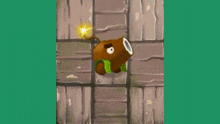 a cartoon character with a bomb on its head is standing on a wooden wall .