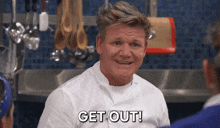 a man in a white chef 's coat says get out