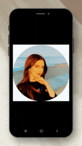 a phone shows a picture of a woman in a circle