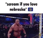 a picture of a wrestler with the caption scream if you love nebraska