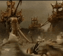 a group of people riding horses in the desert with a monster in the background
