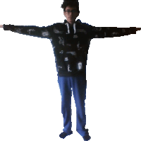 a person with their arms outstretched is wearing a black sweatshirt with a pattern of guns