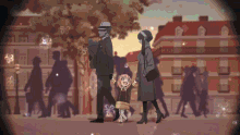 a man and woman are walking with a little girl in a city