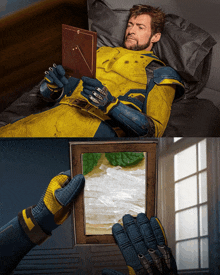 a man in a yellow and blue suit is laying on a bed and holding a picture frame