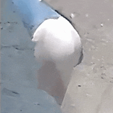 a close up of a hole in a bottle of water