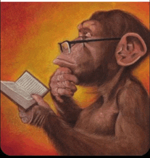 a monkey wearing glasses holds a book in its hand