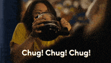 a woman drinking from a coffee pot with the words chug chug chug