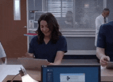 Greys Anatomy Amelia Shepherd GIF - Greys Anatomy Amelia Shepherd Tablet GIFs