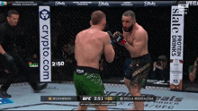 two men are fighting in a boxing ring with a slate protein drinks ad behind them