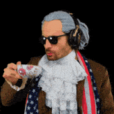 a man wearing a wig and headphones is drinking from a teacup