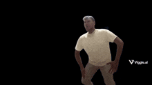 a man in a white shirt is dancing in front of a viggle.ai logo