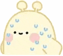 a cartoon drawing of a rabbit with a face and ears and spots on its skin .