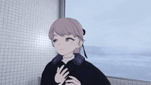 a girl with a ponytail is standing in front of a tiled wall