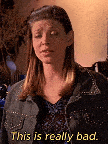 a woman says this is really bad while wearing a jacket