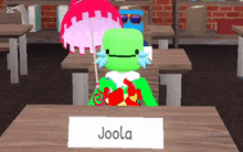 a cartoon character named joola sits at a wooden desk