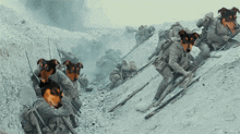 a group of soldiers with dogs on their faces are climbing up a hill