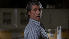 Bad Movies Rule Tremors 2 Movie GIF - Bad Movies Rule Tremors 2 Movie Taking A Look GIFs