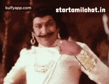a man with a mustache is wearing a white shirt