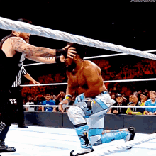 Kevin Owens Stunner GIF - Kevin Owens Stunner Xavier Woods GIFs