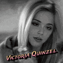 a black and white photo of a woman with the name victoria quinzel on it