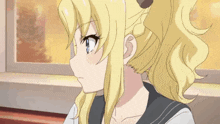 a close up of a blonde anime girl with blue eyes and a ponytail .
