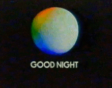 a rainbow colored moon is surrounded by the words `` good night '' on a black background .