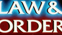 a sign that says law & order in white letters