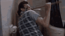 Awkward Ace Ventura GIF - Awkward Ace Ventura Plunger GIFs