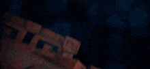 a person is welding a piece of metal and there is a lot of sparks coming out of it