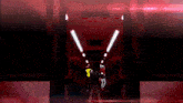 a man and a woman are dancing in a dark room .