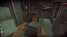 a dark room with a window and a red light coming through